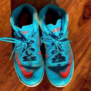 Blue and orange Nike shoes